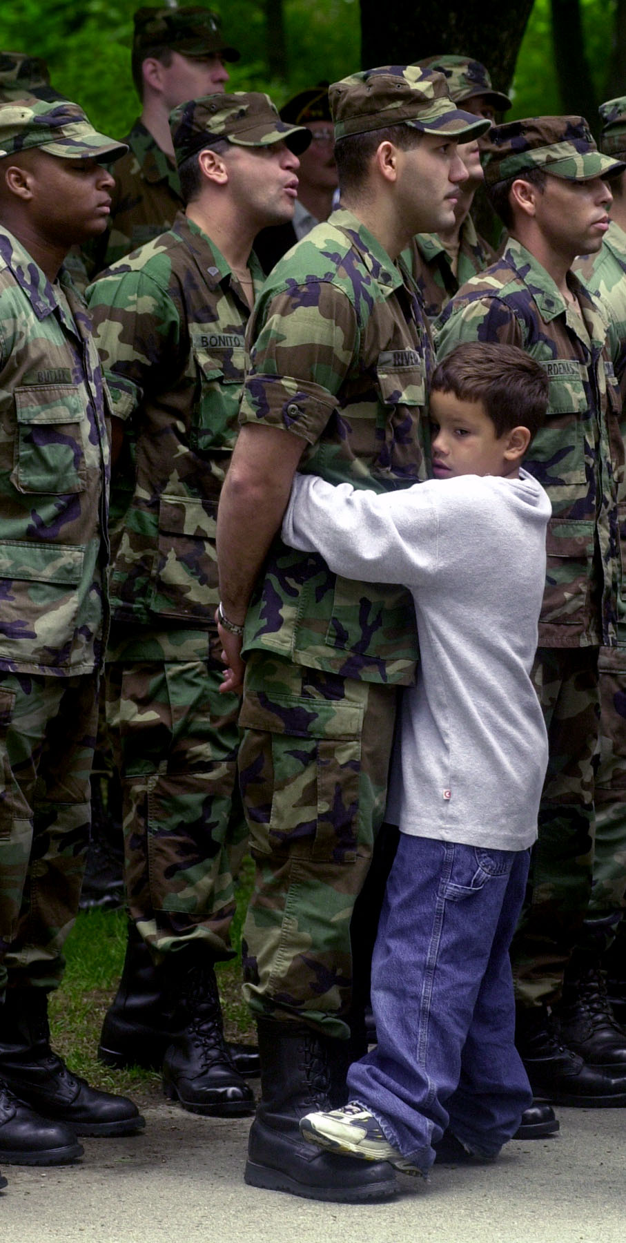 Little boy welcoming his dad back home from military deployment--New Jersey Editorial Photographer