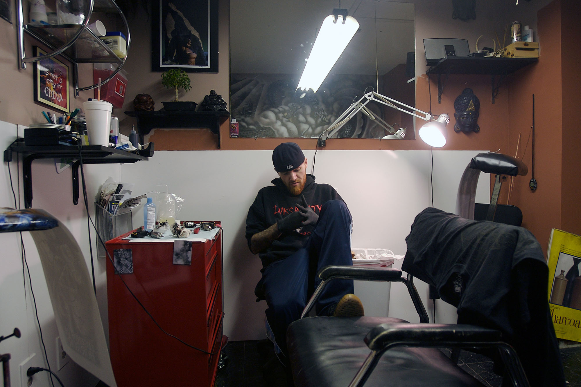 Tattoo Artist taking a break in his studio-New Jersey Portrait Photographer